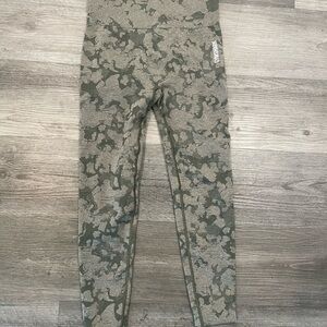 Gymshark Adapt Camo Seamless Leggings in a green camouflage pattern.